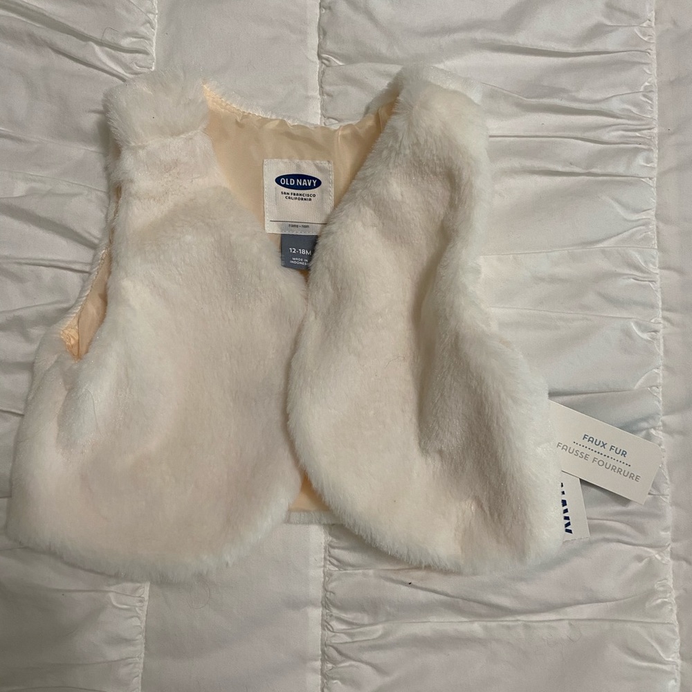 White/cream fuzzy vest